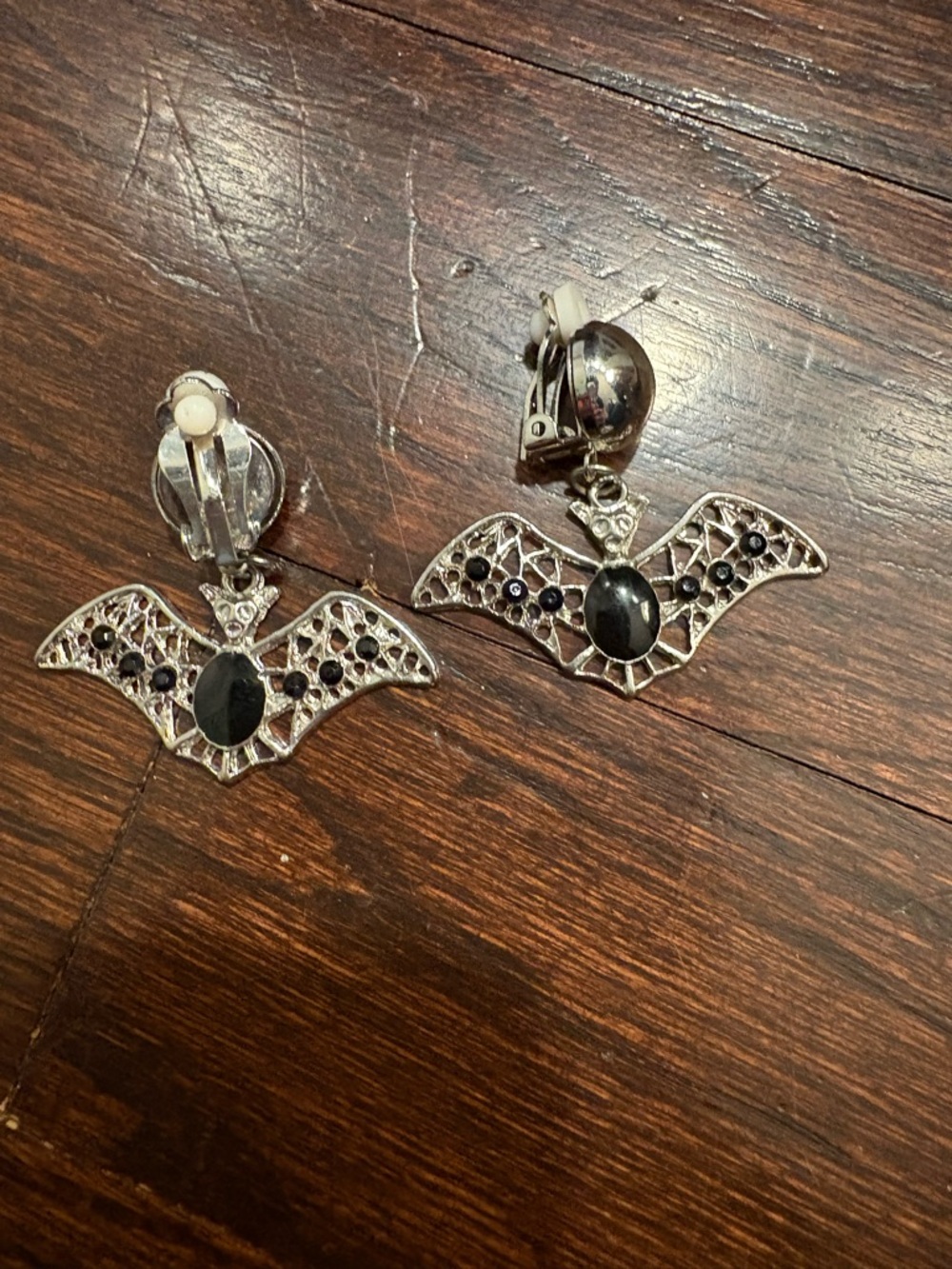 Silver Bat Drop Clip-On Earrings with Black Stones